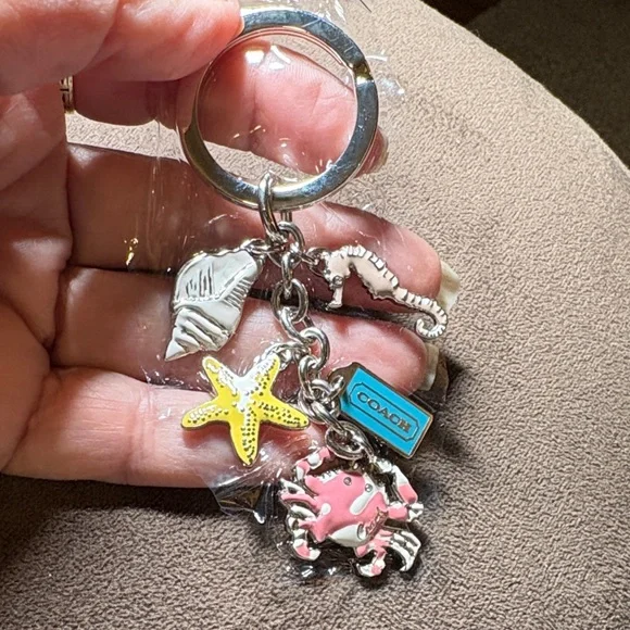 Coach Silver Keychain with Pink And White Crab And Other Colorful Beach Charms - Picture 1 of 6